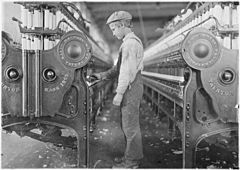 A doffer in Lincolnton Mill. Lincolnton, N.C. Lewis Hine 1908