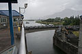 The swing bridge begins to open as a barge approaches the Bonneville Navigation Locks