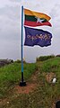 The flag of Myanmar flown alongside the flag of Tanintharyi Region on 1199 Mountain Peak in Kawthaung.