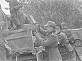 German soldiers loading a vehicle during the surrender.