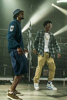 CJ Fly (left) with Joey Badass at the Under the Influence Tour in Toronto, Canada in August 2013