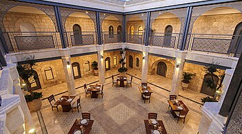 The Spanish-style patio (courtyard)[1] of the Sephardic House (the hotel run by the Sephardic Educational Center)