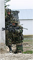 Soldiers equipped with laser tag training equipment
