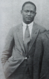 Black and white photo from the late 1920s featuring ZK Matthews, elegantly dressed in a suit.