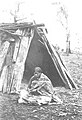 Aboriginal woman in front of bark gunya (shelter), Victoria, c. 1872