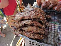 Barbecued rats for sale near Suphan Buri, Thailand