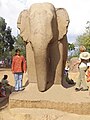 Elephant sculpture amongst the rathas