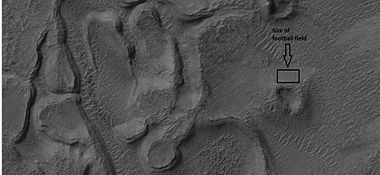 Enlargement of above image showing hollows with box showing the size of a football field, as seen by HiRISE under HiWish program