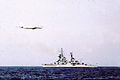 Sverdlov underway with a Tupolev Tu-95 above, date unknown.