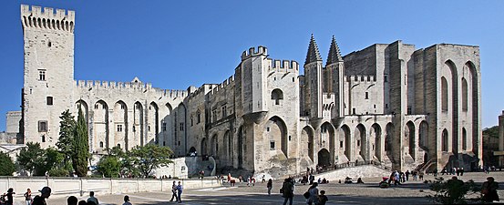 View of the Palais des Papes from the square on the western side