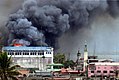 A building in Marawi is set ablaze by air strikes carried out by the Philippine Air Force.