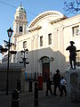 The exterior of the Cathedral of St. Mary the Crowned. The statue of the soldier outside the cathedral is a gift from the Corps of the Royal Engineers to commemorate the formation in Gibraltar of the Company of Soldier Artificers in 1772, which later became the Royal Engineers in 1856.[6]
