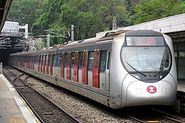 SP1900 train E217 on the East Rail line at Kowloon Tong station