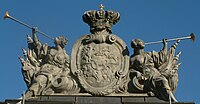 Ciołek coat of arms as presented in the Polish–Lithuanian Commonwealth coat of arms. Ciołek coat of arms was borne by Stanislaus II August, the king of Poland. The sculpture is situated on Guardhouse in Poznań.