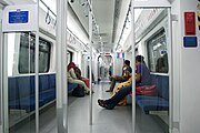 Interior of the KTM Class 92 EMU, end coaches feature longitudinal seating.