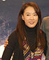 Kang Soo-Yeon in 2009 with straighten hair looking to the left and smiling