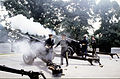 Members of the Presidential Salute Guns Battery, 3rd Infantry Regiment, render a gun salute with 3" anti-tank guns during a military funeral at Arlington National Cemetery on August 10, 1998.