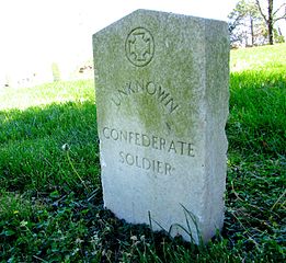 Standard government headstone for unknown Confederate soldier with a Southern Cross of Honor emblem in Beechgrove, Tennessee