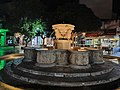 Morossini fountain at night