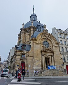 A picture of the architecturally impressive Temple du Marais as seen from the street.