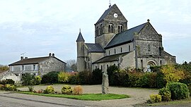 The church and menhir in Champigneul-Champagne