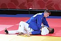 Bronze medal match: Kimy Bravo vs. Javier Peña (on top)