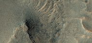 Color view of mesa breaking up into boulders, as seen by HiRISE under HiWish program
