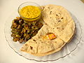 Spicy vegetables served with rotis