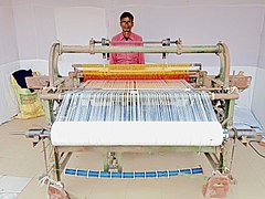 Weaver from India showing handloom during an exhibition