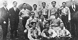 Eleven players of Monza in three rows wearing collared shirts facing the camera