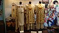 Capa pluvial (cope) and ornately embroidered dalmatic pairs (late 1800s, early 1900s, Our Lady of Manaoag museum, Philippines)