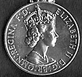 Elizabeth II (1st type); inscription has 'BR OMN' (1952–1958)