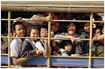 A songthaew loaded with students heading home in Amphoe Kantharalak