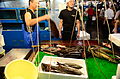 Fishermen cutting fish at Tsukiji