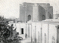 A US flag flies over the US Consulate near Arg of Tabriz during Iran's Constitutional Revolution.