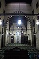 The interior of the mosque, which resembles the reception hall (qa'a) of a house or mansion.