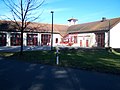 Feuerwehrhaus mit Fahrzeughalle und Schlauchturm in Schnaittach