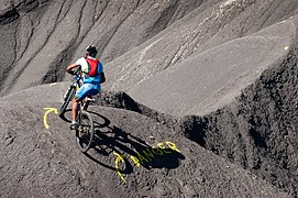 A mountain biker negotiates a tricky turn