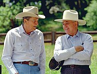 Reagan and Gorbachev relaxing at Rancho del Cielo in May 1992. Reagan gave Gorbachev a white cowboy hat, which he wore backwards.