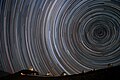 Image 36Starry circles arc around the south celestial pole, seen overhead at ESO's La Silla Observatory. (from Earth's rotation)
