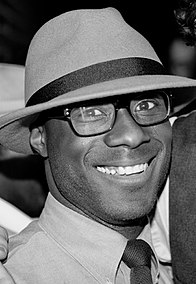 A black and white photo of the director Barry Jenkins