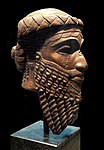 This bronze head traditionally attributed to Sargon is now thought to actually belong to his grandson Naram-Sin.[48]