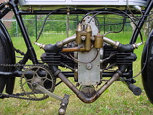 This 1912 Douglas has modern chain-drive but still has pedals
