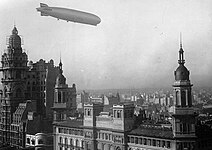 The Graf Zeppelin flying over the building in 1934
