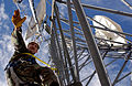 Oregon Air National Guardsman performs an inspection survey on a communications tower.