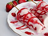 Kulfi with strawberry sauce