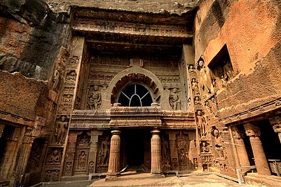 The Ajanta Caves are 30 rock-cut Buddhist cave monuments built beneath the Vakatakas.