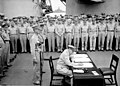 File:Douglas MacArthur signs formal surrender.jpg