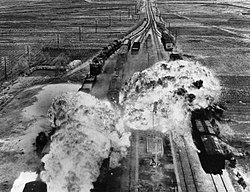 A bomb explodes on a moving train.