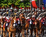 The cavalry regiment of the Republican Guard opening the motorised parade (formerly cavalry parade)